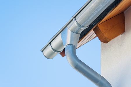 The Secret Weapon for a Healthy Roof: Gutter Cleaning & Brightening Explained